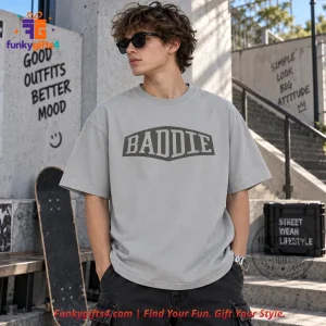 Grand Theft Auto VI x Lucia Baddie Light Gray Varsity Graphic T-Shirt 9 Grand Theft Auto VI x Lucia Baddie Light Gray Varsity Graphic T-Shirt